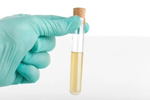Vaccine in glass tube holding in hand Stock Photos