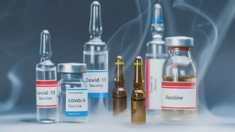 Vaccine for lethal virus in small bottles Stock Footage 143433327