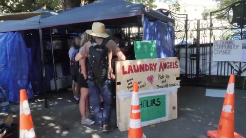 Vaccine Mandate Protesters Laundry Tent Stock Footage 170998737