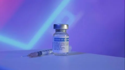 Vaccine on Neon Background Stock Footage 150235064