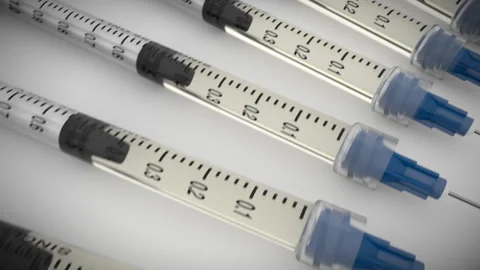 Vaccine syringe background Vídeo Stock 344131652