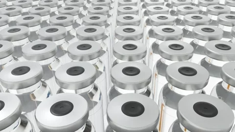 Vaccine vials repeating in a pattern of neat rows and columns Stock Footage 303883721
