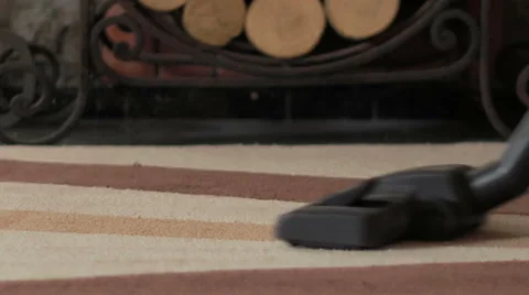 Vacuum cleaner on the carpet Stock Footage 53254616