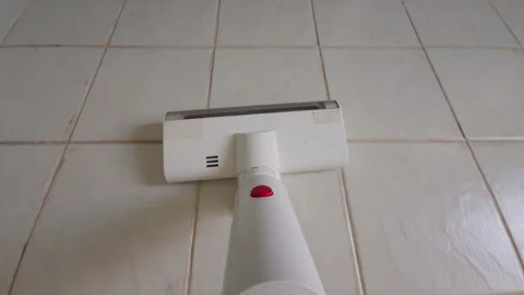 Vacuum Cleaner Head On Light Tile Floor First Person View Cleaning Smooth Surfac Stock Footage 331154382