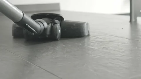 Vacuum Cleaner Nozzle Moving Across Tiled Floor Stock Footage 345654632