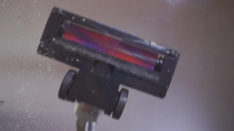 Vacuum cleaner operating. Concept of cleaning in the apartment and office Stock Footage 121342041