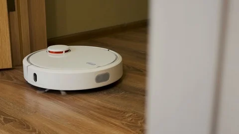 Vacuum Cleaner Robot cleans the room Stockbeeldmateriaal 124310163