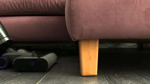 Vacuum Cleaner Unable to Reach Under Sofa Stock Footage 341930644