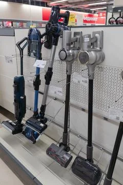 Vacuum cleaners on display at an electronics store in Russia. Stock Photos
