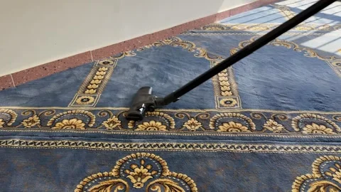Vacuum Cleaning Blue Patterned Carpet Stock Footage 341717151