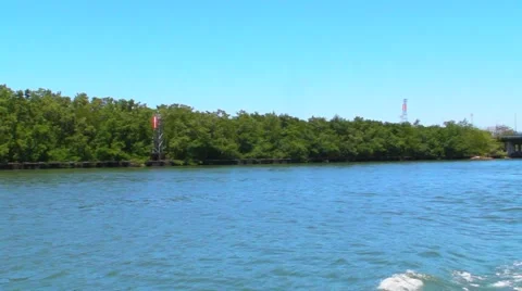 Vacuum Dredging Barge at channel side Stock Footage 6930483