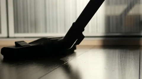 Vacuum the floor with a brush, close-up. 4k, 3840x2160. HD Stock Footage 74992329