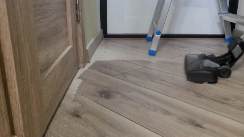 Vacuum the floor. Stock Footage 233360151