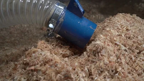 Vacuum machine sucks chips to transfer raw material shavings Stock Footage 195956489