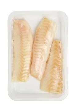 Vacuum packed cod fillets isolated on white background close up Stock Photos