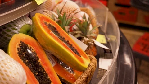 Vacuum-packed fresh fruit on the store shelf in the supermarket Stock Footage 244460340