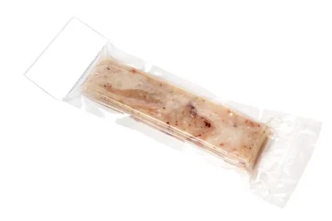 Vacuum packed minced fish Stock Photos