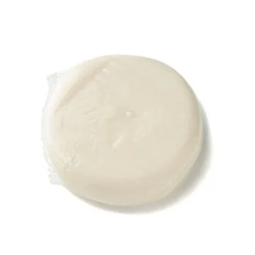 Vacuum packed mozzarella cheese. View from above. White background. Isolated. Stock Photos
