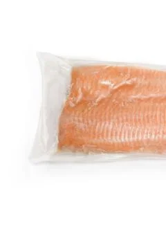 Vacuum packed red fish isolate on a white background. Place for text. Stock Photos