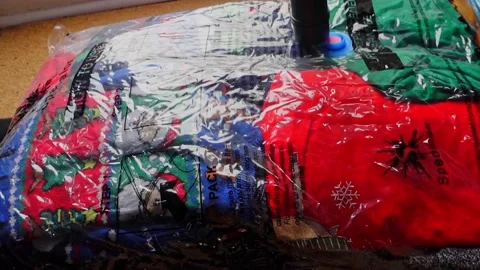 Vacuum Packing Clothes Stock Footage 152095934