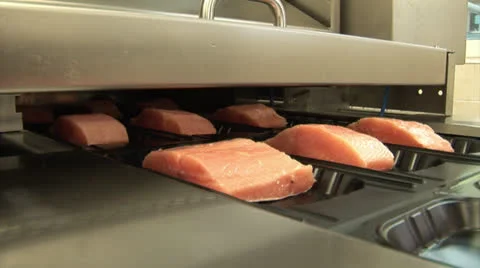 Vacuum packing red fish (trout, salmon, pink salmon). Seafood processing plant Video stock 24951988