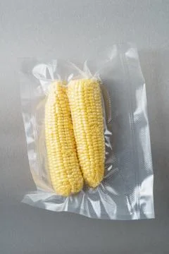 Vacuum sealed corncobs Stock Photos