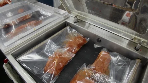 Vacuumed Packaging meat at the factory Stock Footage 94156277