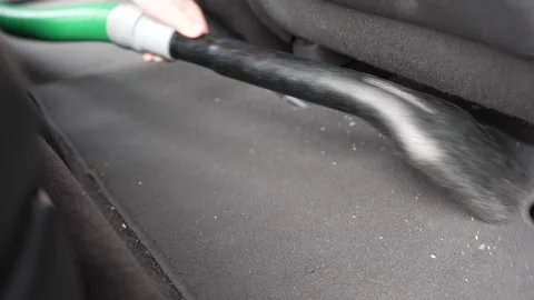 Vacuuming Car Interior Floor Mat Close Up 4K Stock Footage 336450924