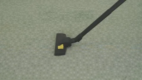 Vacuuming-carpet-floor-side-angle-top-view Stock Footage 344943546