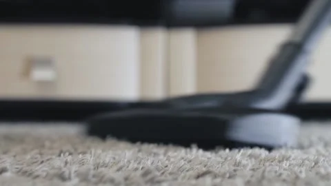 Vacuuming carpet Stock Footage 139009323