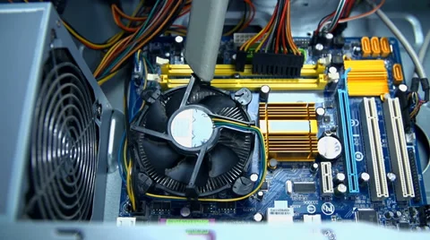 Vacuuming cooling ribs on computer processor Stock Footage 39391422