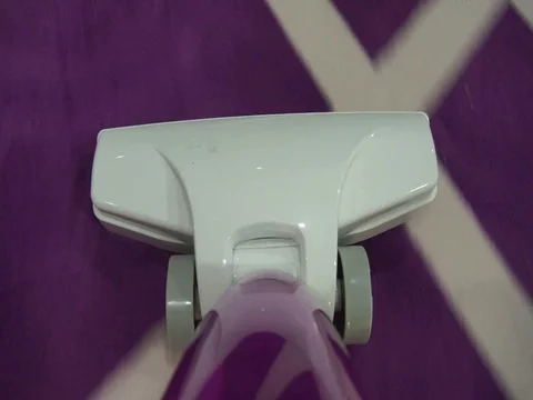 Vacuuming the floor Stock Footage 104686129