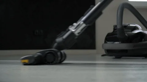 Vacuuming floor 库存影片 109575311