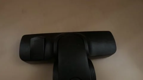 Vacuuming laminate floor Stock Footage 121688446