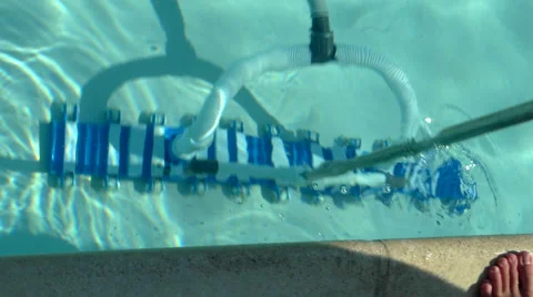 Vacuuming the pool Stock Footage 41431828