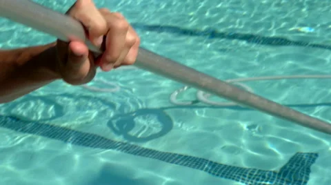 Vacuuming the pool Stock Footage 41431994
