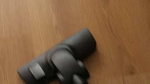Vacuuming the room, top view. Video stock 105107641