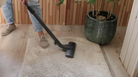 Vacuuming white carpet in the bathroom 動画素材 282337518