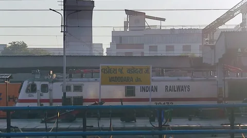 Vadodara junction Indian Railways train platform Gujarat India transport hub Stock Footage 334688724
