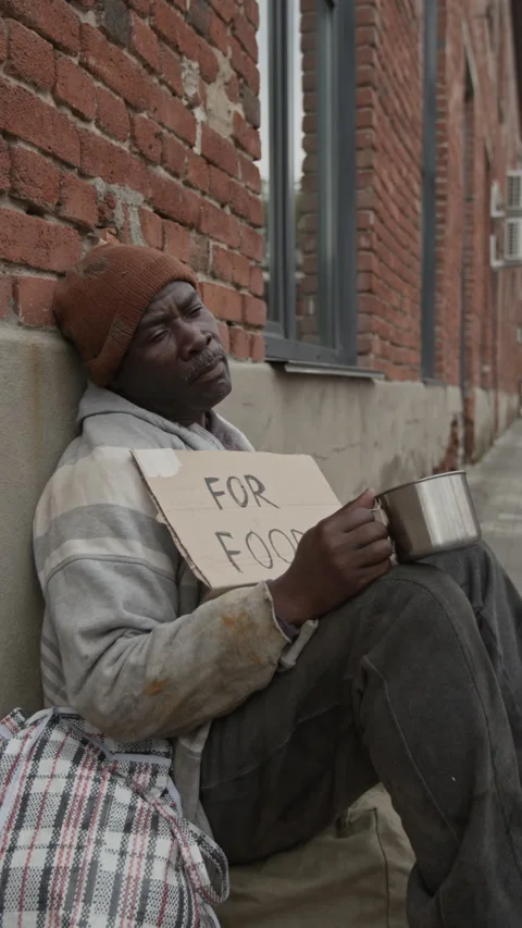 Vagrant Looking at Empty Cup with Disappointment, Rubbing Eyes Begging for Money Stock Footage 317308110