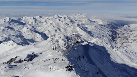 Val Thorens Cime de Caron cable car in the 3 Vallee ski area in vertiginous and Stock Footage 101555885