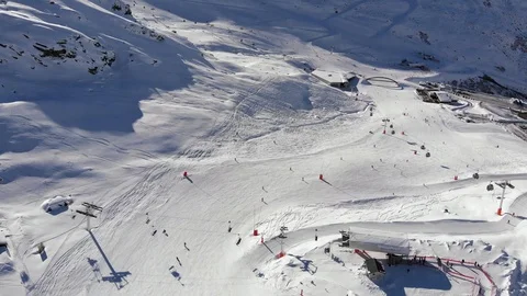 Val Thorens slopes fly over with drone skiers lifts Stock Footage 102286153
