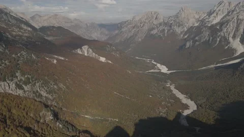 Valbona valley high panning shot, 4K Drone Stock Footage 219759452