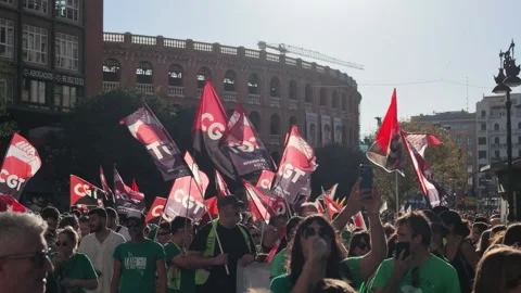 VALENCIA, SPAIN - 2026/09/12: Union flags wave against hazy sky in Valencia. Stock Footage 345450566