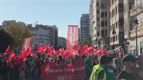 VALENCIA, SPAIN - 2026/09/12: Union flags fill wide Valencia avenue at teachers. Stock Footage 345450587