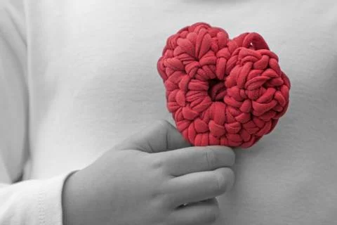Valentine crochet decorations crochet heart chest back and white Stock Photos