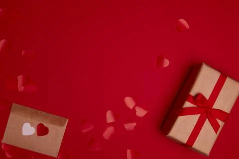 Valentine day composition with copy space. Present or gift box wraped in craf Stock Photos