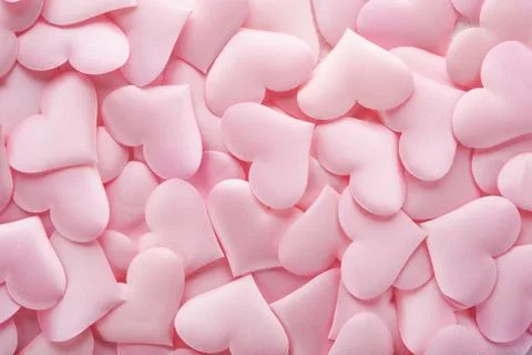 Valentines Day abstract background texture from textile silk or satin heart.. Stock Photos