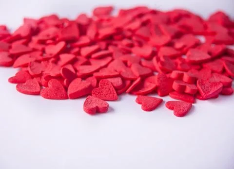 Valentines day background with red heart shaped candies Stock Photos