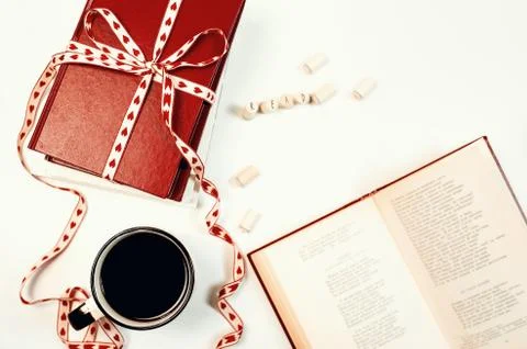 Valentines day background. Stack of books with ribbon Stock Photos
